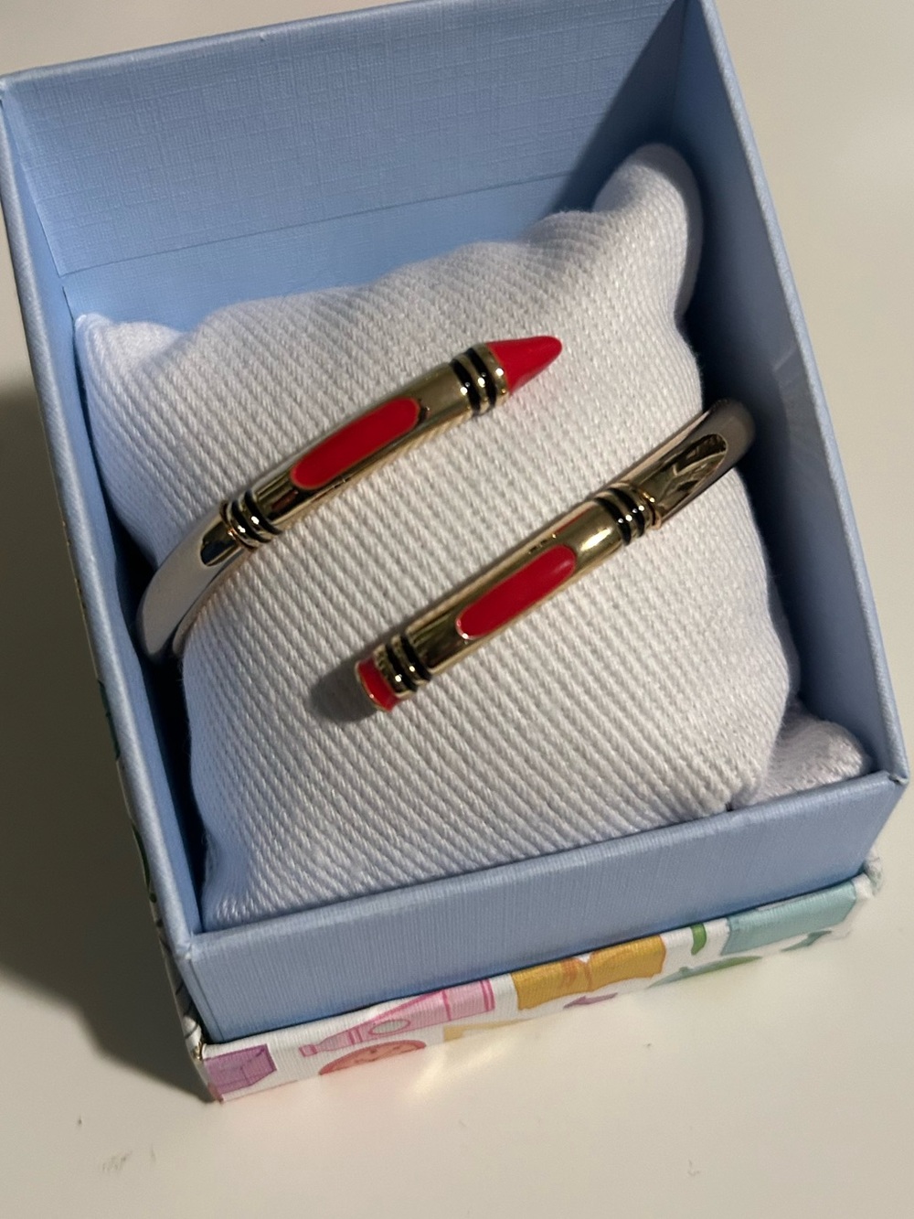 Red & gold crayon bracelet with red crayon-shaped accents #crayon #bracelet